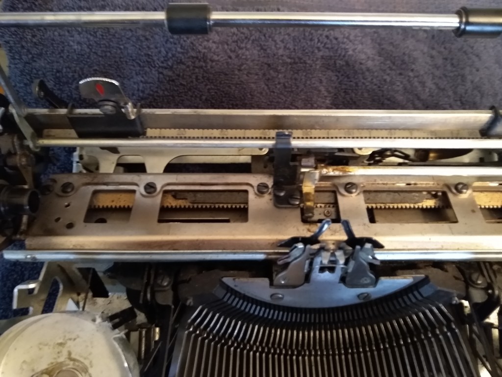 Typewriter innards before cleaning