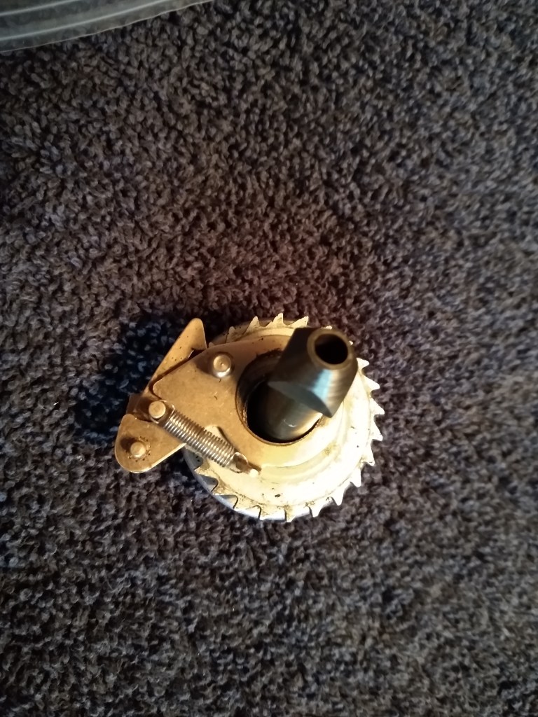 Carriage return ratchet, before disassembly