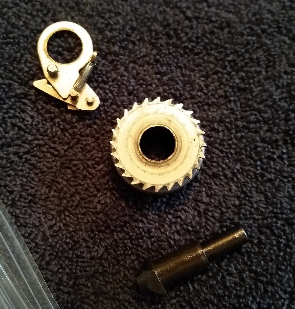 Carriage return ratchet, fully apart